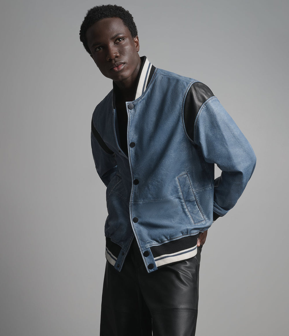 Ashford blue leather varsity jacket, side view — OX & ARMOUR