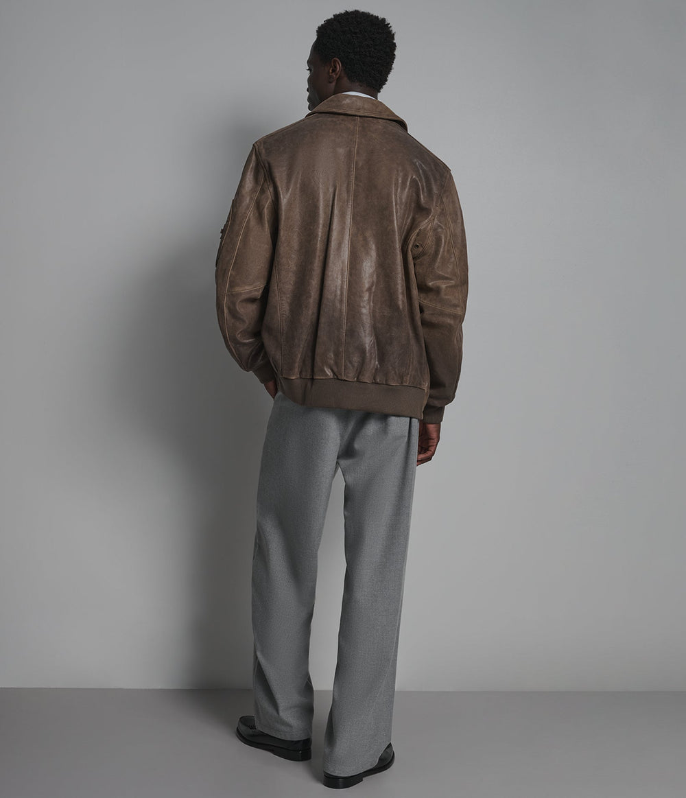 Brooks brown vintage leather bomber jacket, back view — OX & ARMOUR