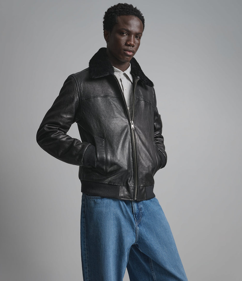 Kingsley black leather bomber jacket with shearling collar, detail view — OX & ARMOUR