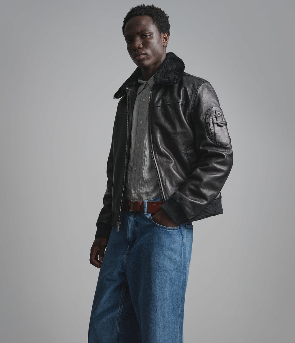 Kingsley black leather bomber jacket with shearling collar, detail view — OX & ARMOUR