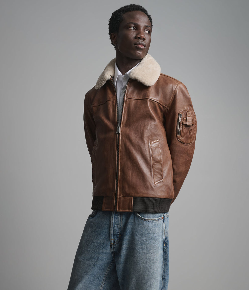 Kingsley cognac leather bomber jacket with shearling collar, side view — OX & ARMOUR