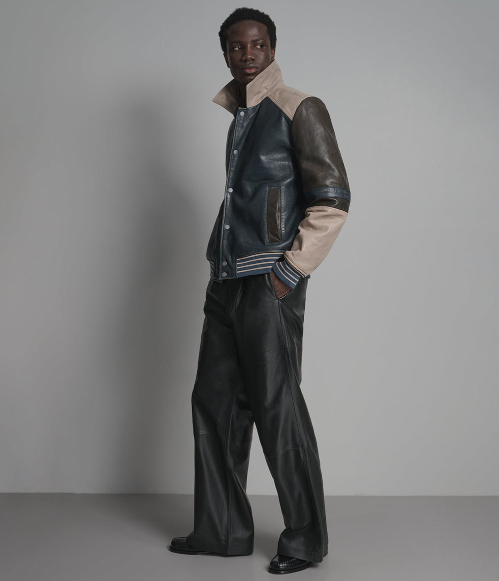 Sinclair navy and grey leather varsity jacket, side view — OX & ARMOUR